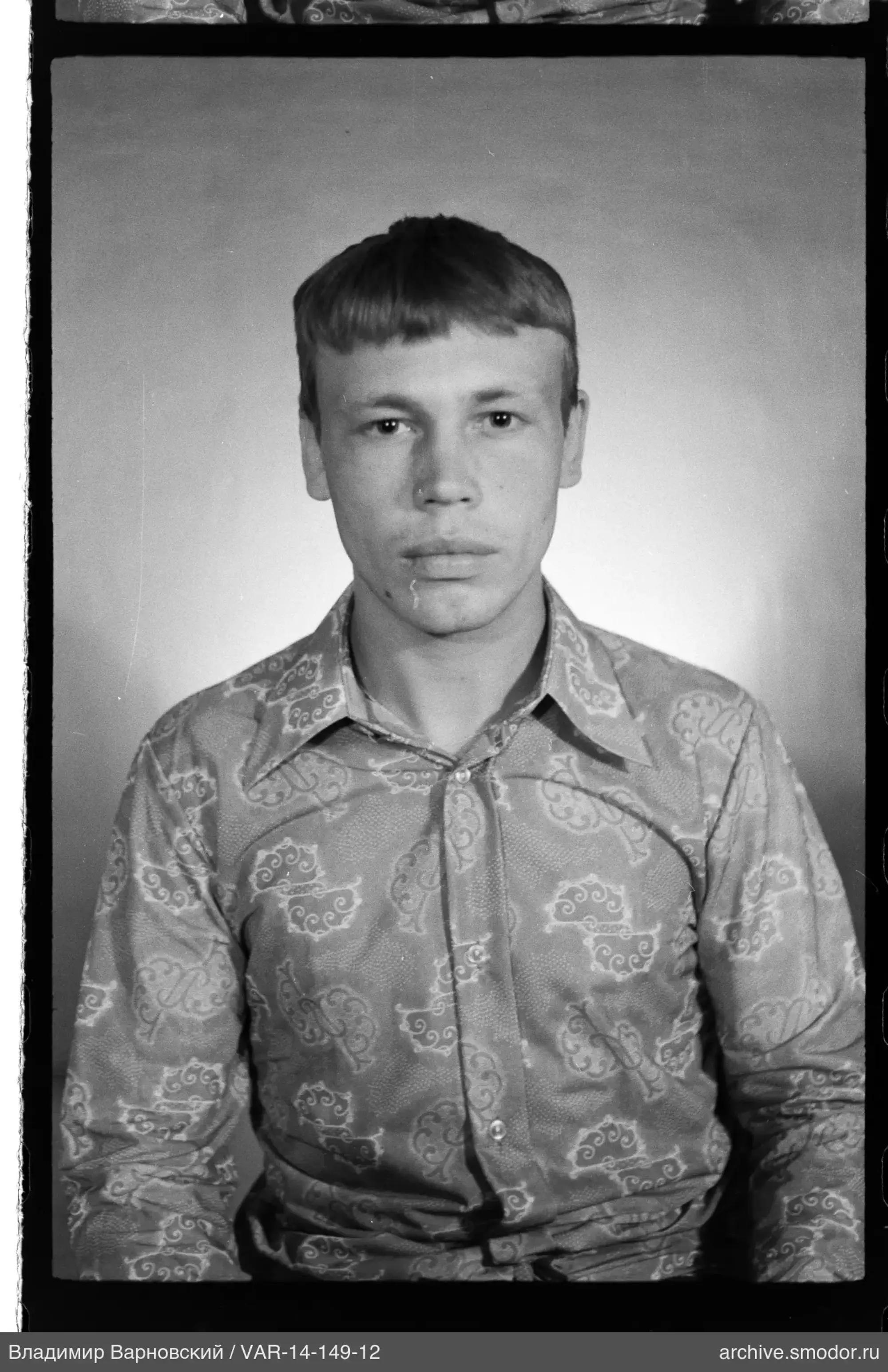 Portrait of a man with a patterned shirt