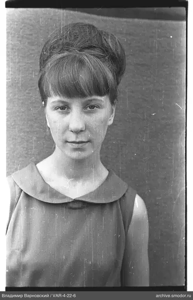 Bust portrait of a woman in a sleeveless dress