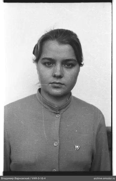 Portrait of a woman in a light cardigan