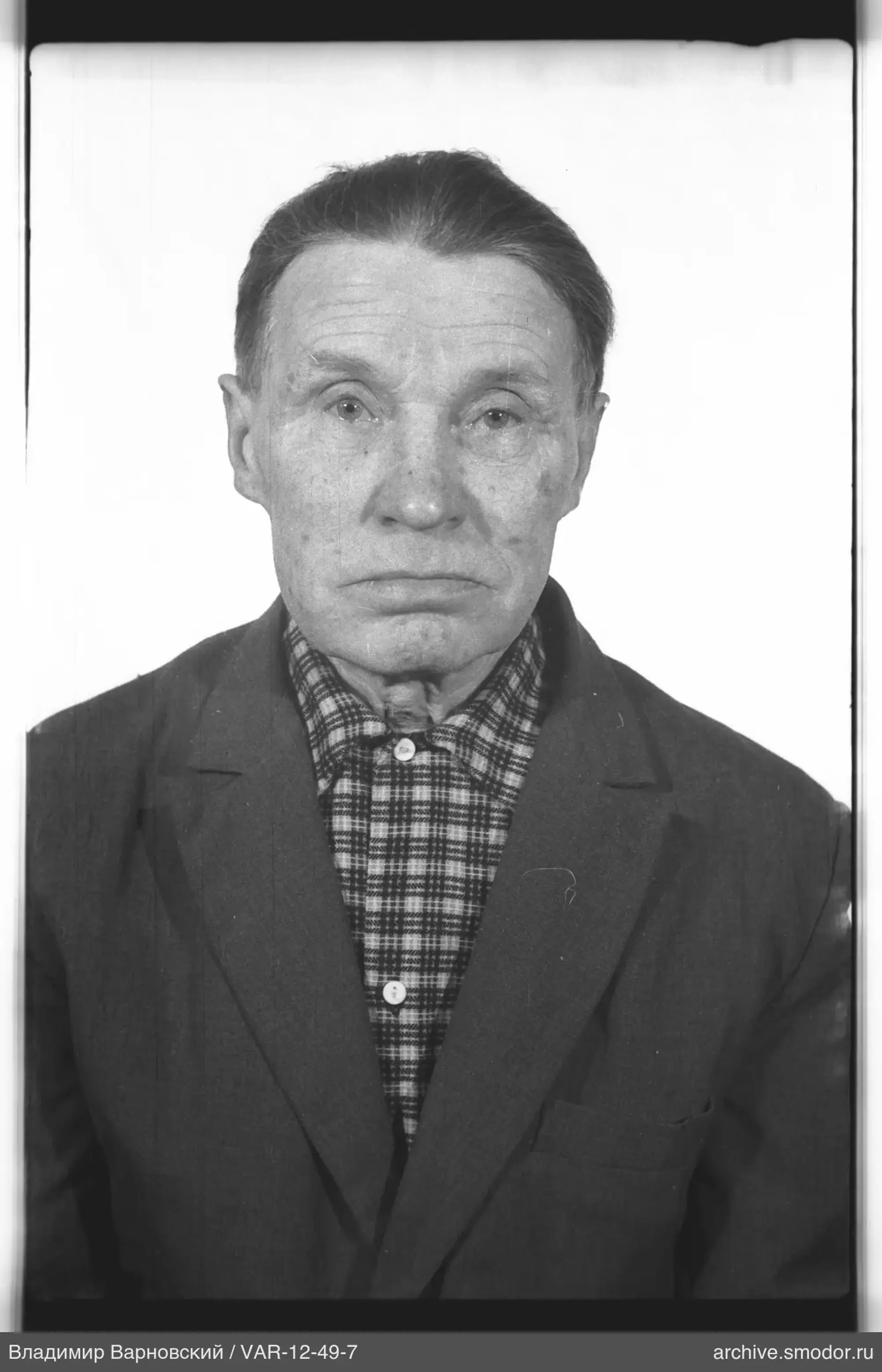 Portrait of a man in a dark jacket