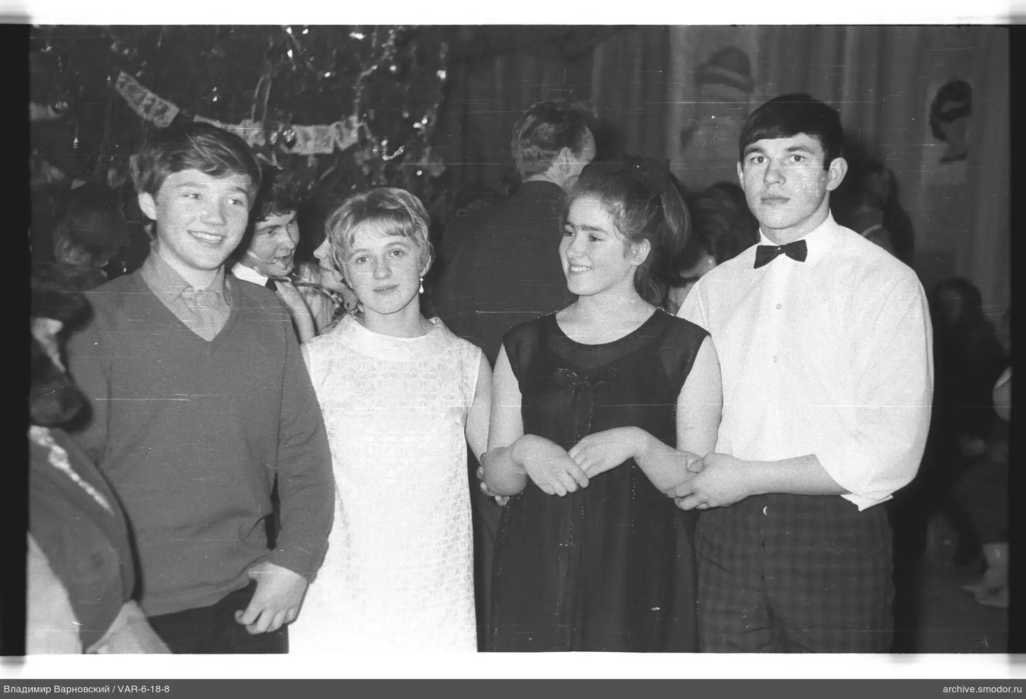 Group portrait with decorations and garlands