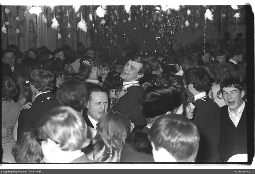 Group of people at event with Christmas tree