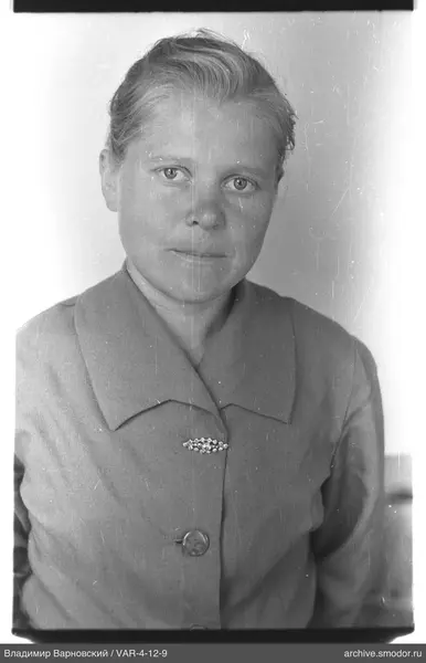 Portrait of a woman in a light jacket