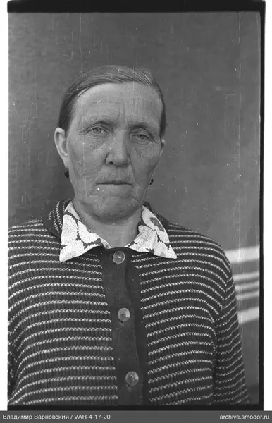 Portrait of a woman in a striped cardigan