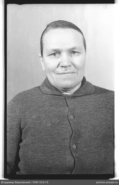 Portrait of a woman in a dark cardigan