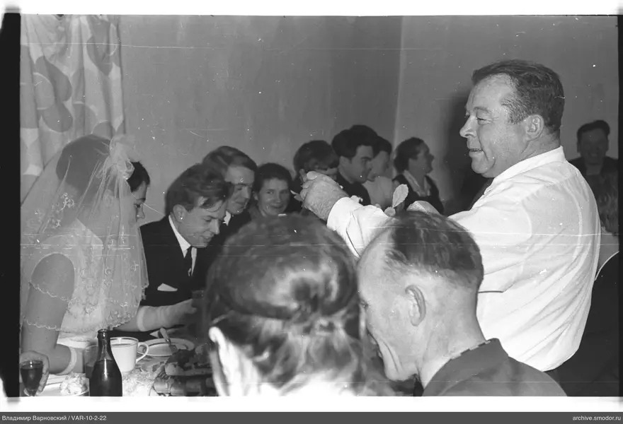 Group of people at a table with a bride