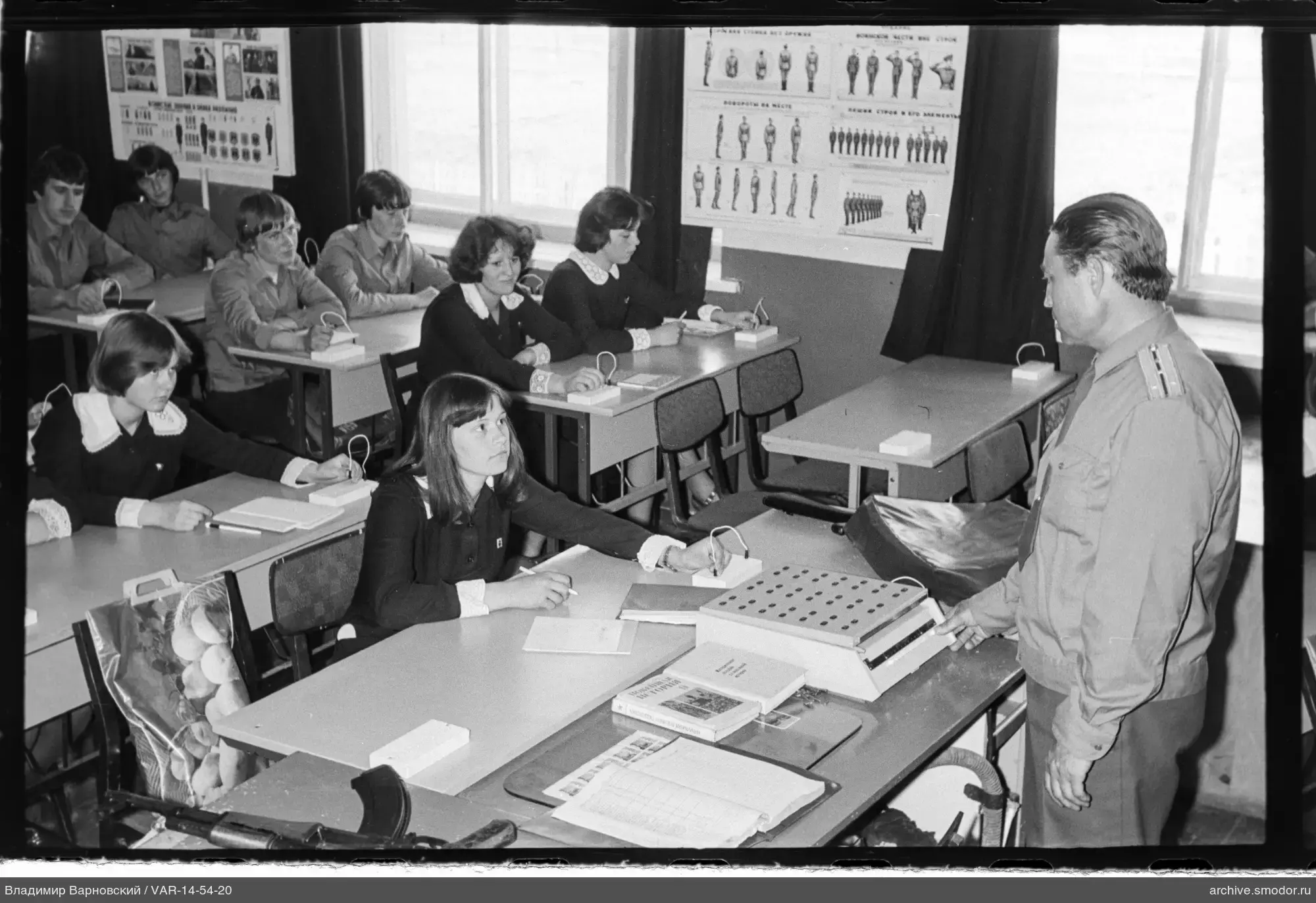 Classroom scene with military-themed teaching