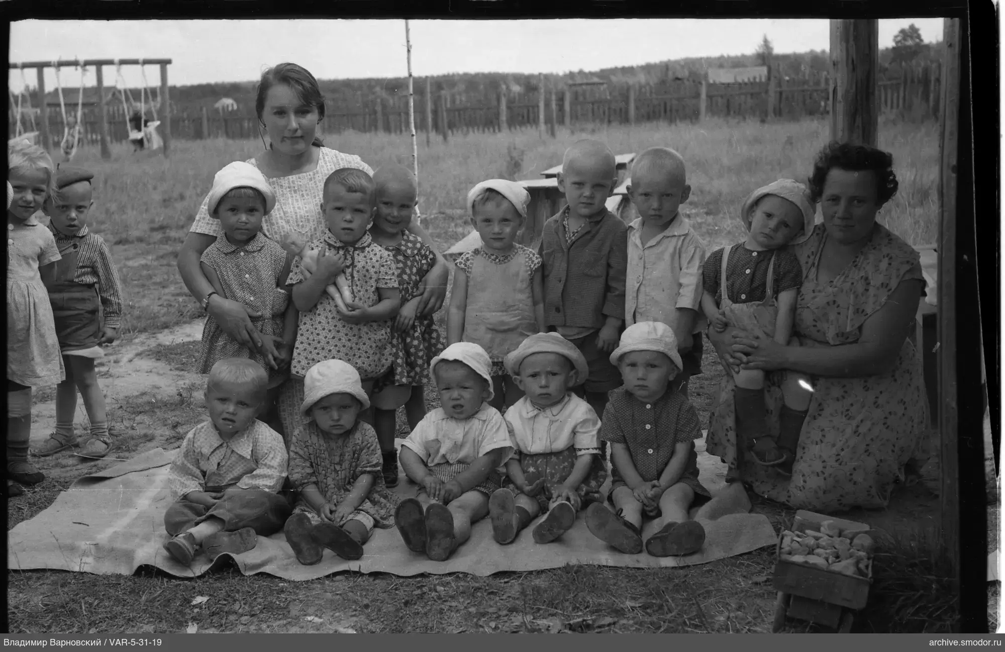 Group portrait of children and women