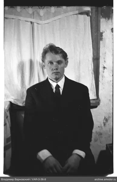 Full-length portrait of a man in a suit