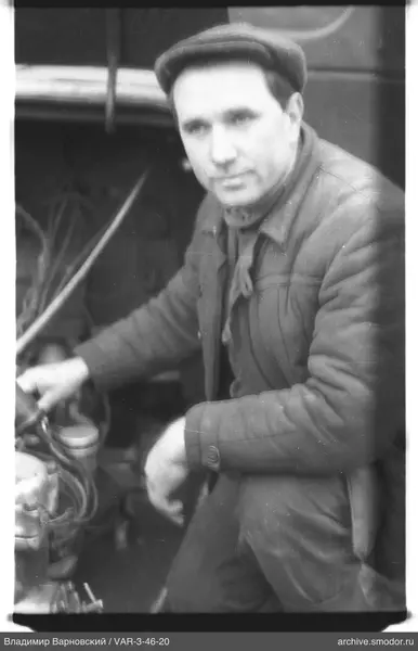 Man with pipes and wires mechanism