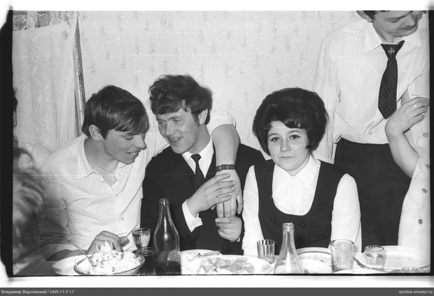 Group portrait of young people at a table