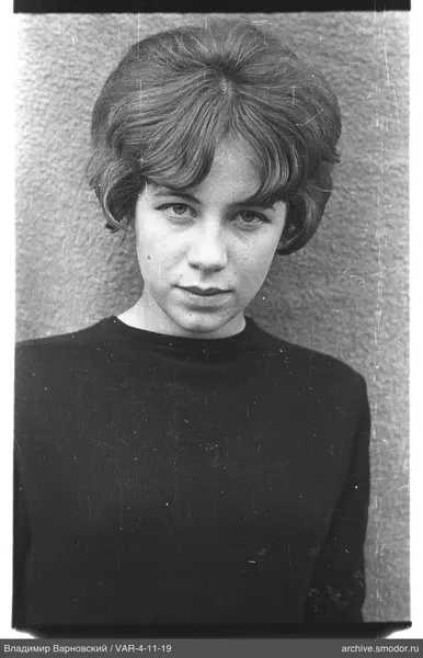Portrait of a woman in a dark sweater