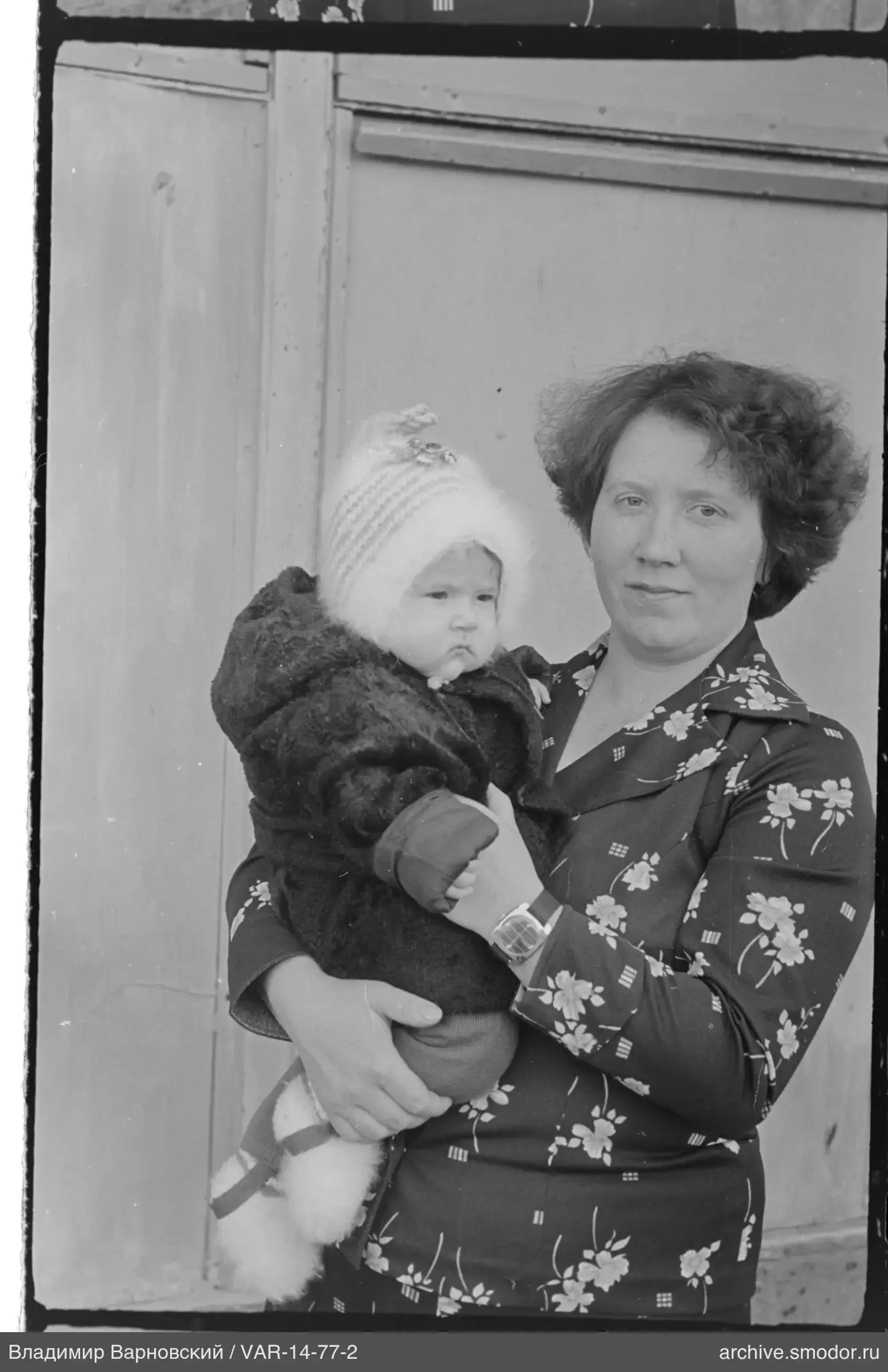 Portrait of a woman with a child
