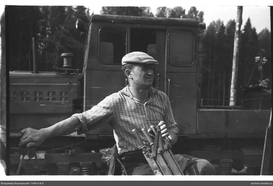 Man at machine controls
