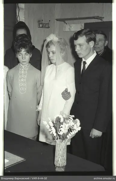 Group portrait with flowers and background