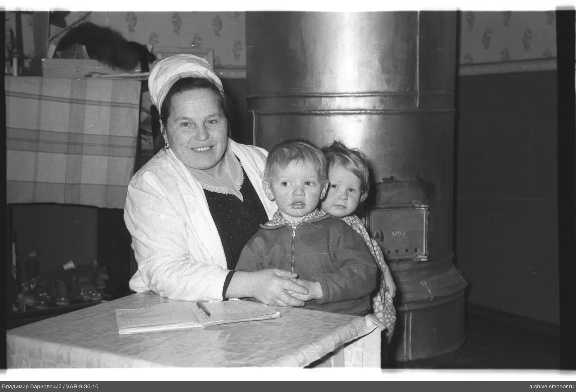 Woman with children at table