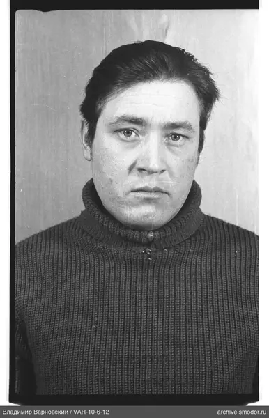 Portrait of a man in a dark sweater