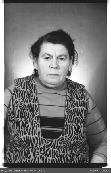Portrait of a woman in a striped sweater