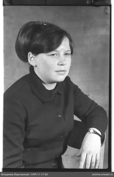 Portrait of a woman with a watch