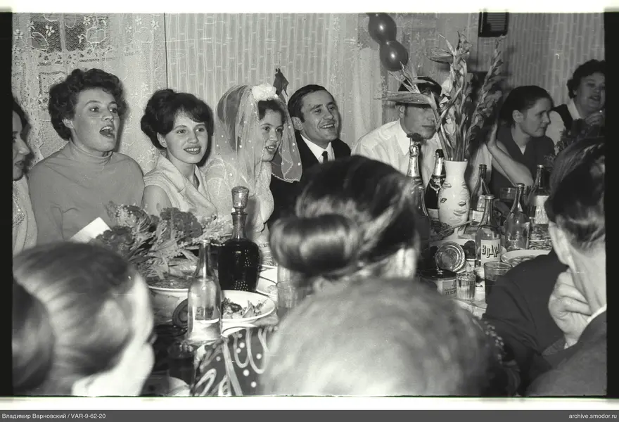 Group portrait with woman in wedding dress