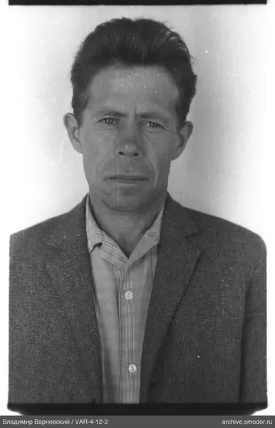 Portrait of a man in a light shirt and jacket