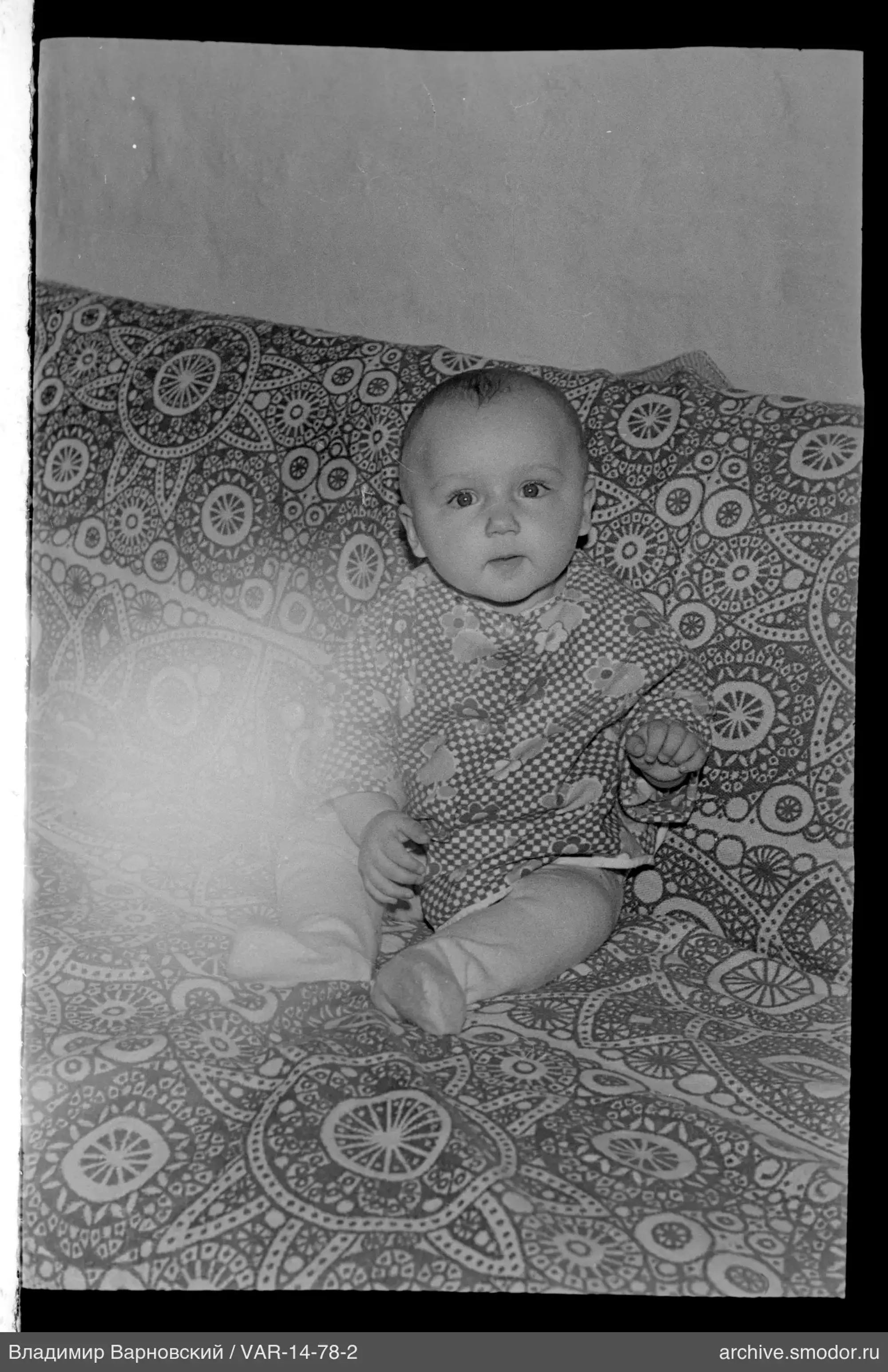 Child portrait with raised hands