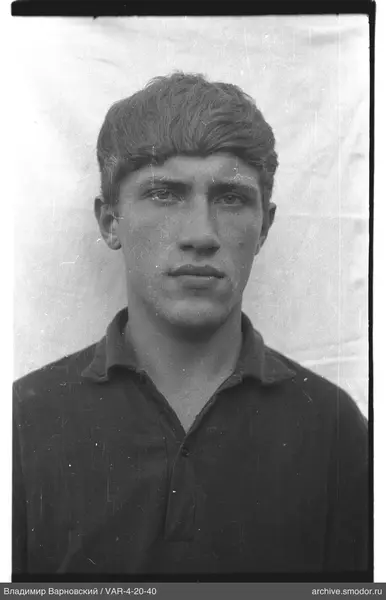 Portrait of a man with short light hair