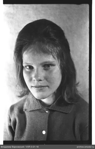 Girl's portrait in a dark sweater