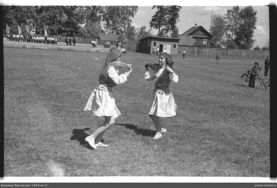 Two girls dancing on the field