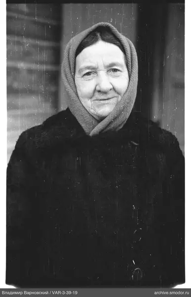 Portrait of a woman with a headscarf