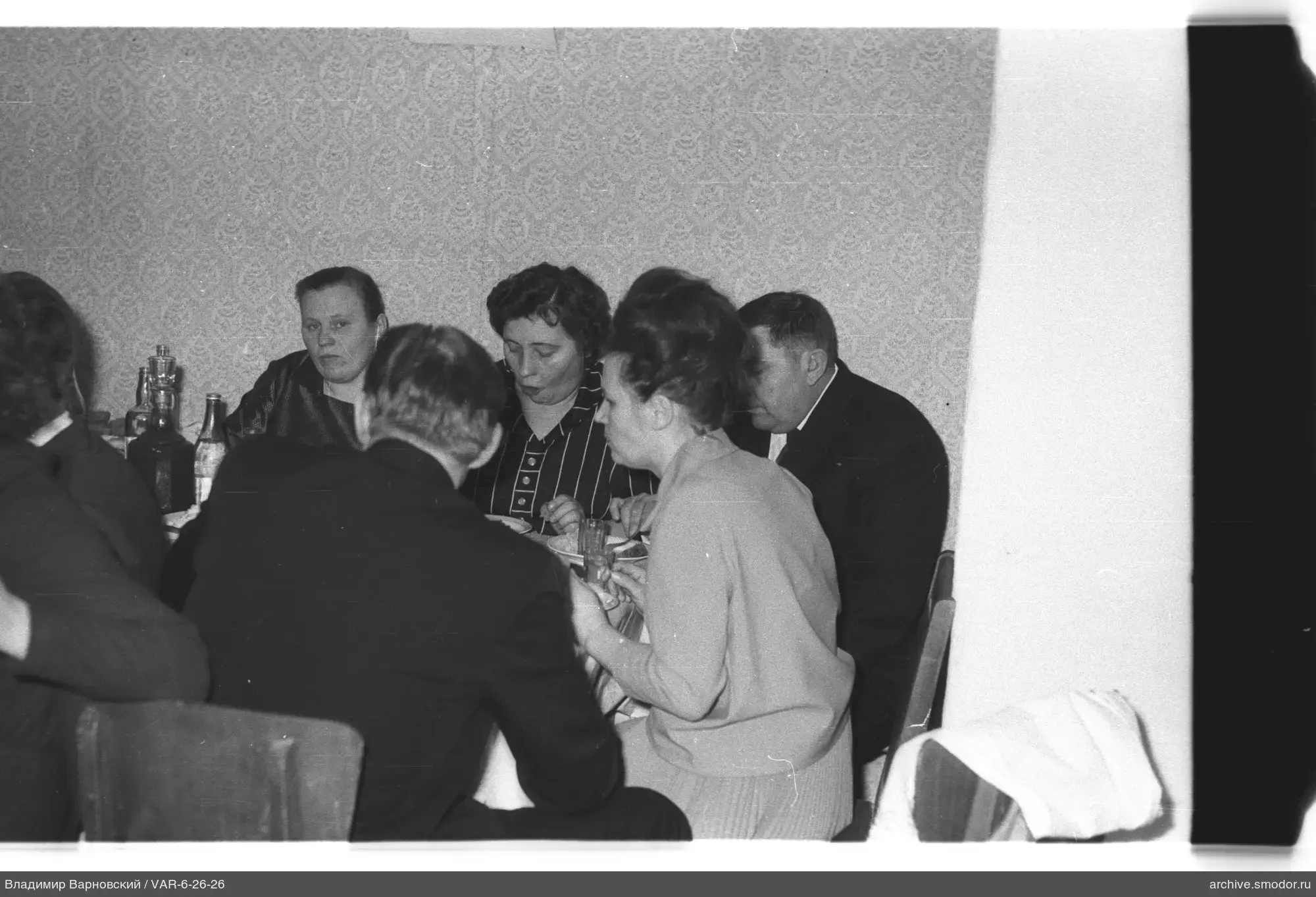 People sitting at a table during an event
