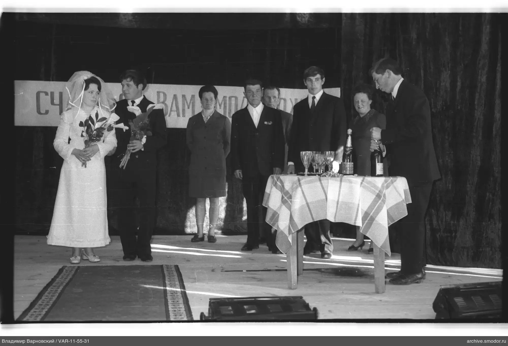 Group portrait with a table of drinks