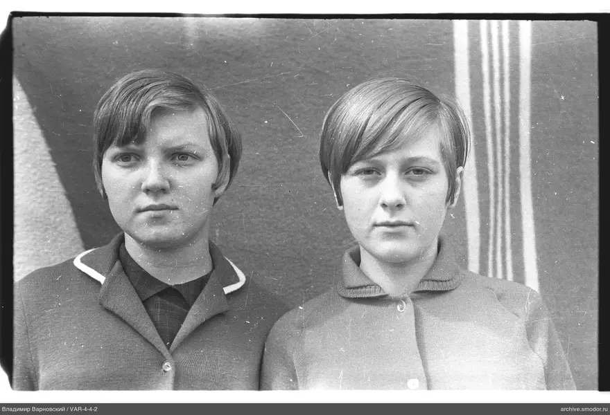 Two women with short haircuts