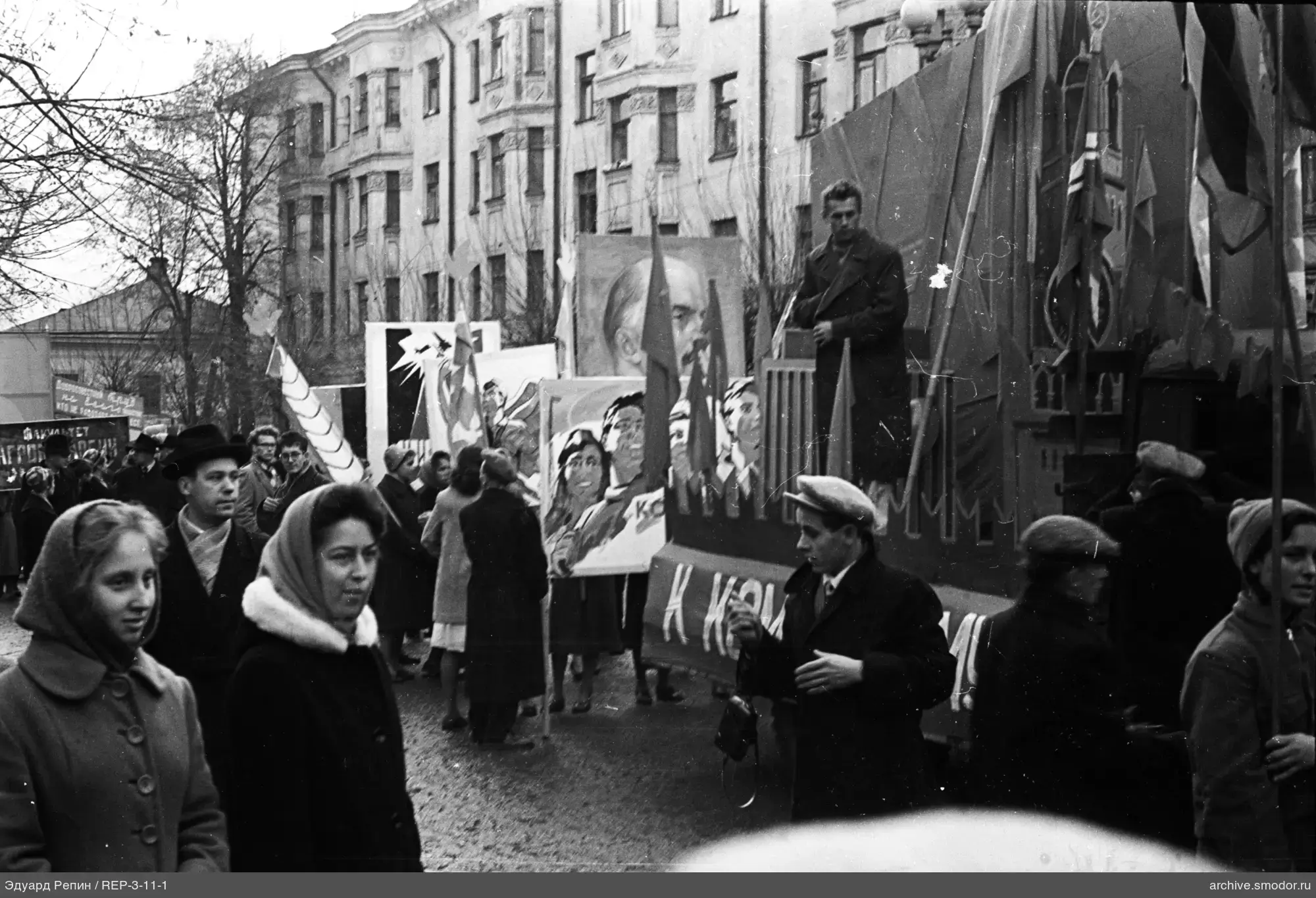 Group of people on the street with posters and flags