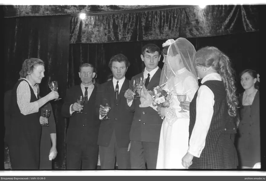 Group portrait with bride and groom