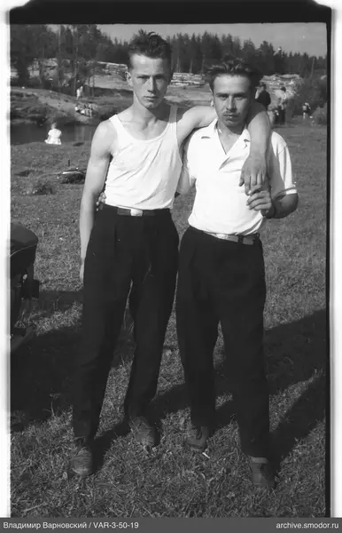 Two young men on the grass