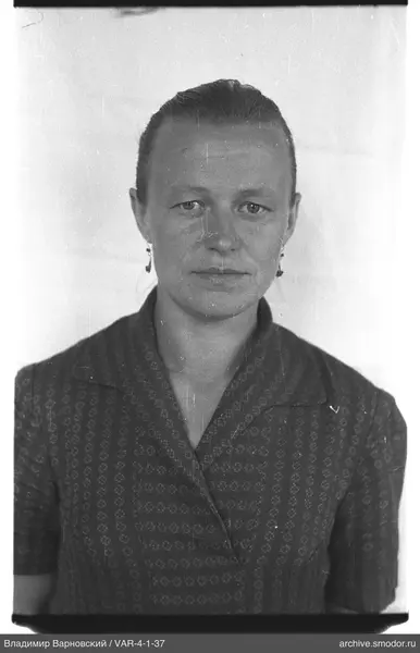 Portrait of a woman in a dark dress