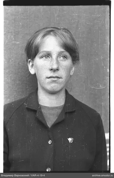 Portrait of a woman with badge