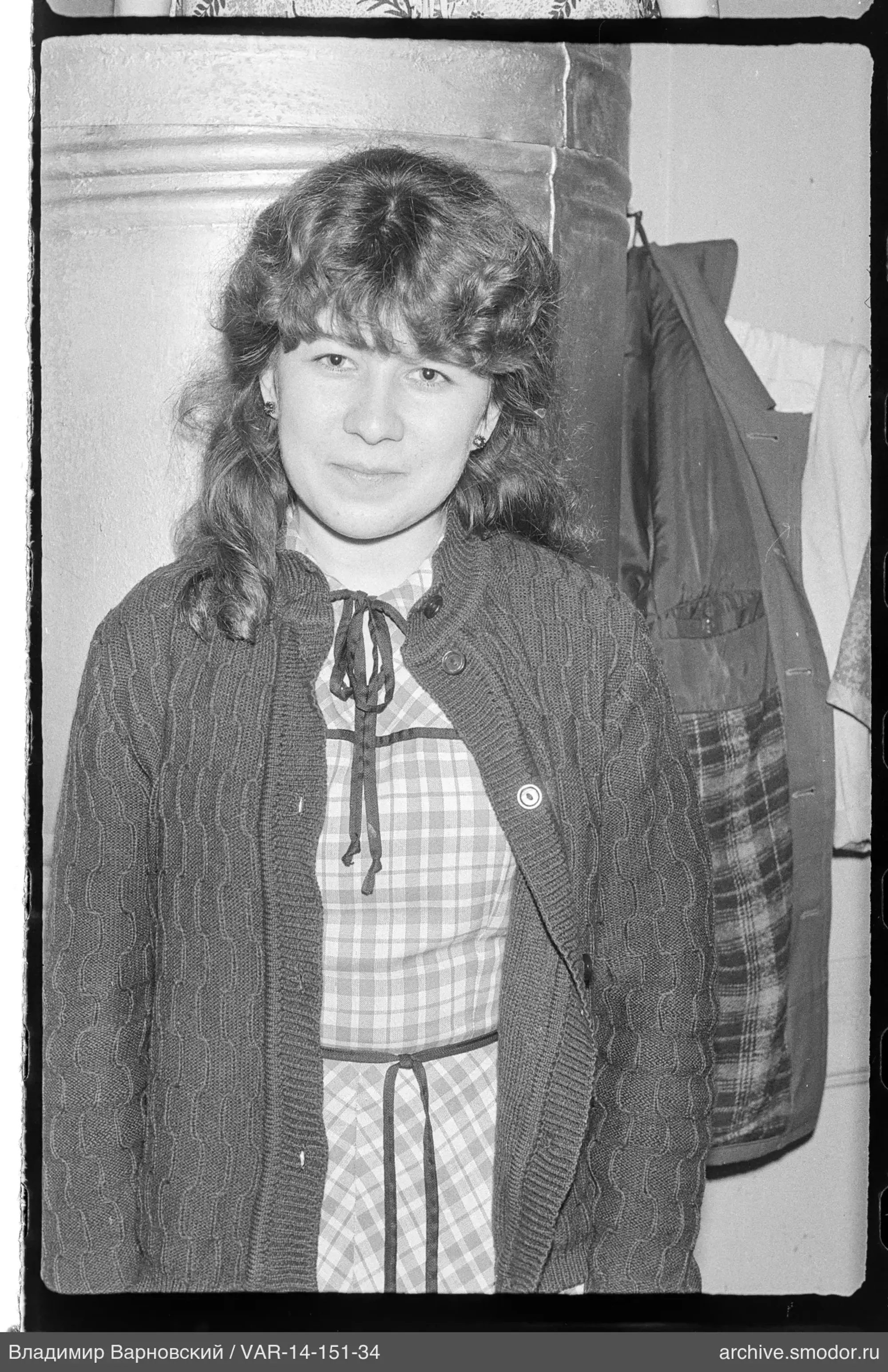 Portrait of a woman in a knitted cardigan