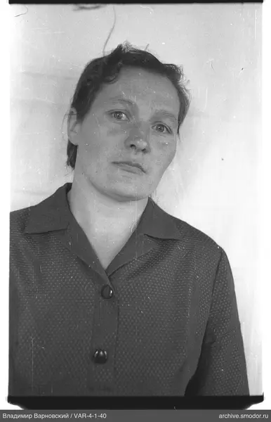 Portrait of a woman with short wavy hair