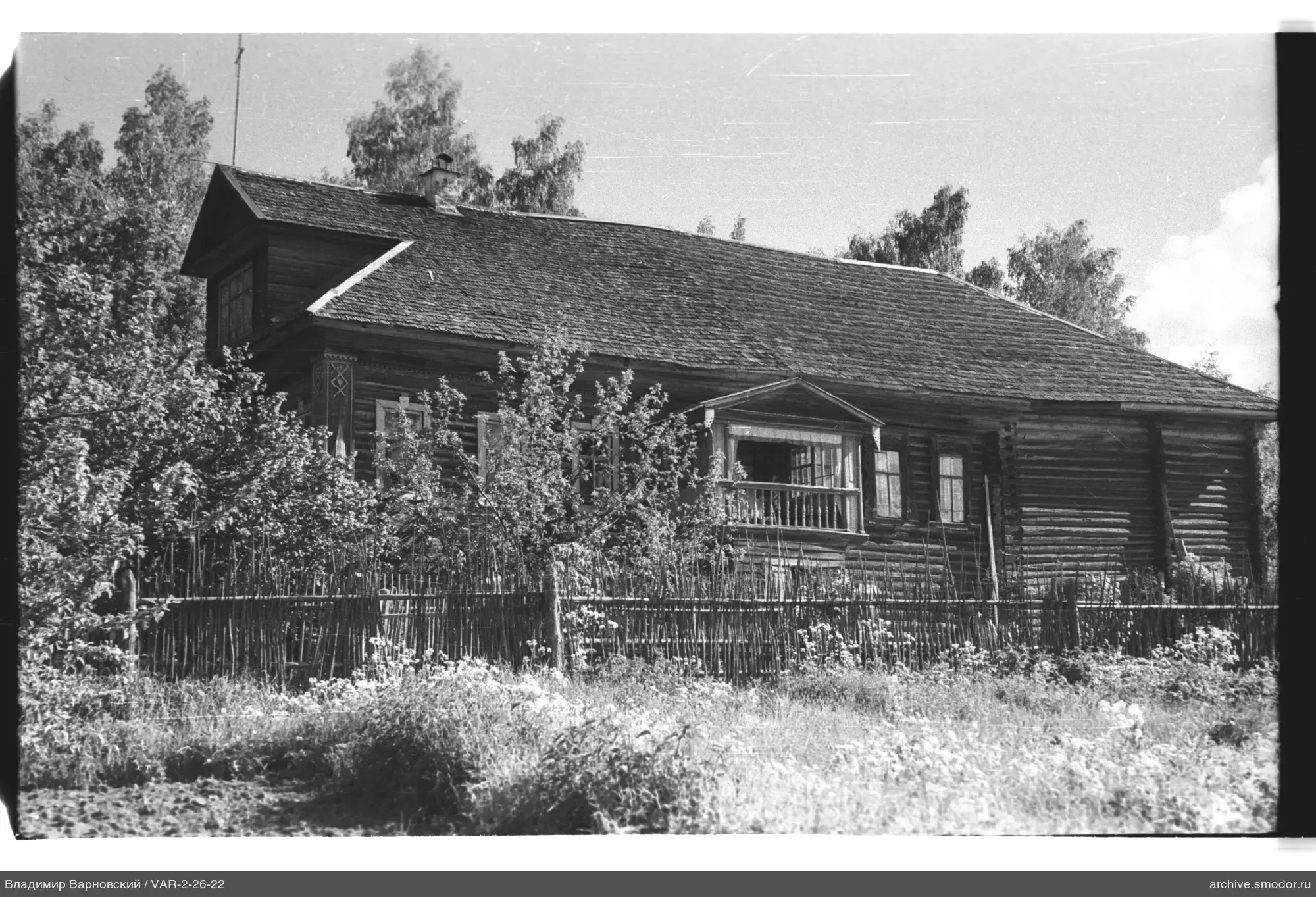 Wooden house with mansard window