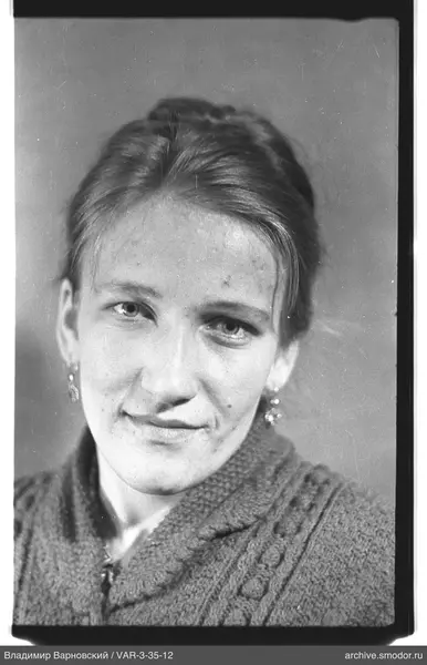 Portrait of a woman in a dark sweater