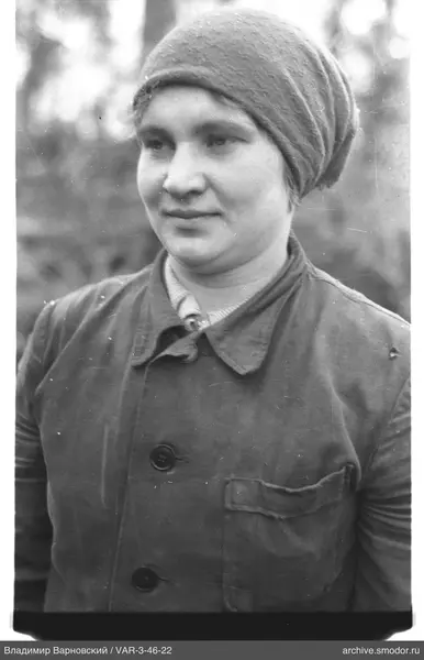 Portrait of a woman with headscarf and jacket