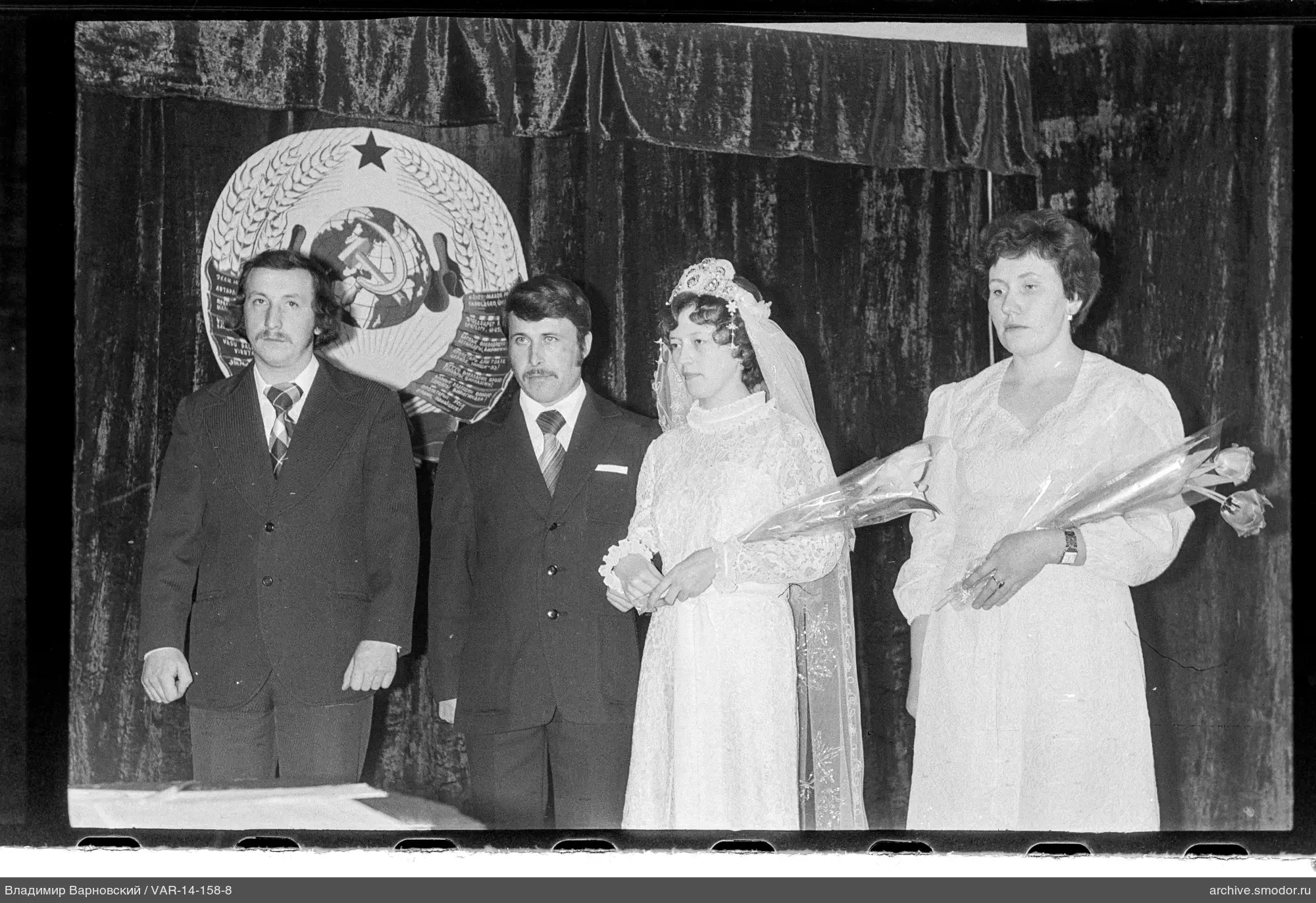 Group portrait with USSR coat of arms