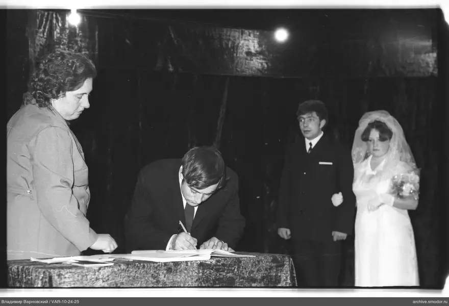 Signing a document at an event