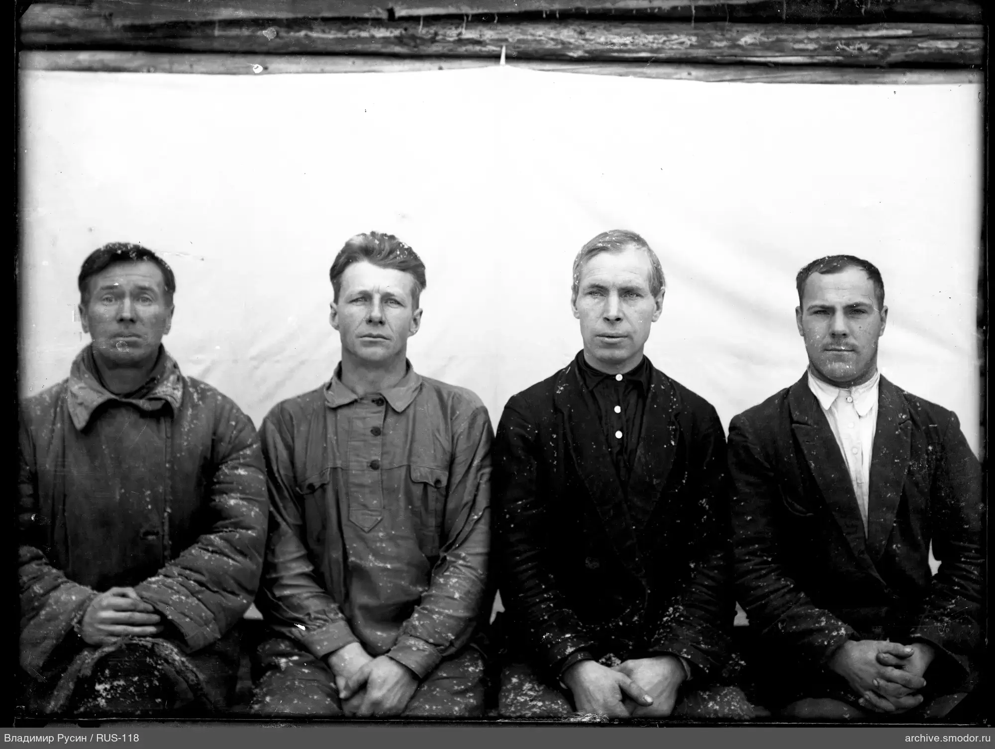 Group portrait of four men