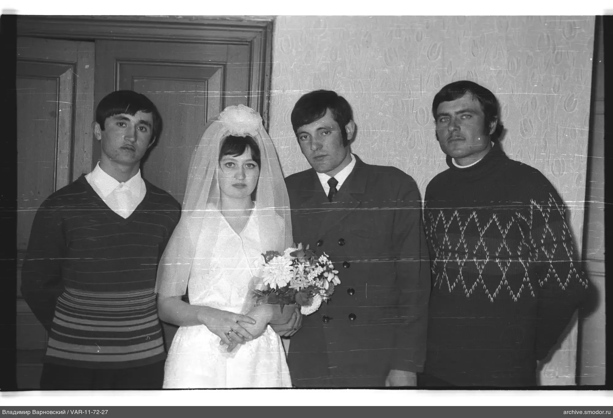 Group portrait of four people