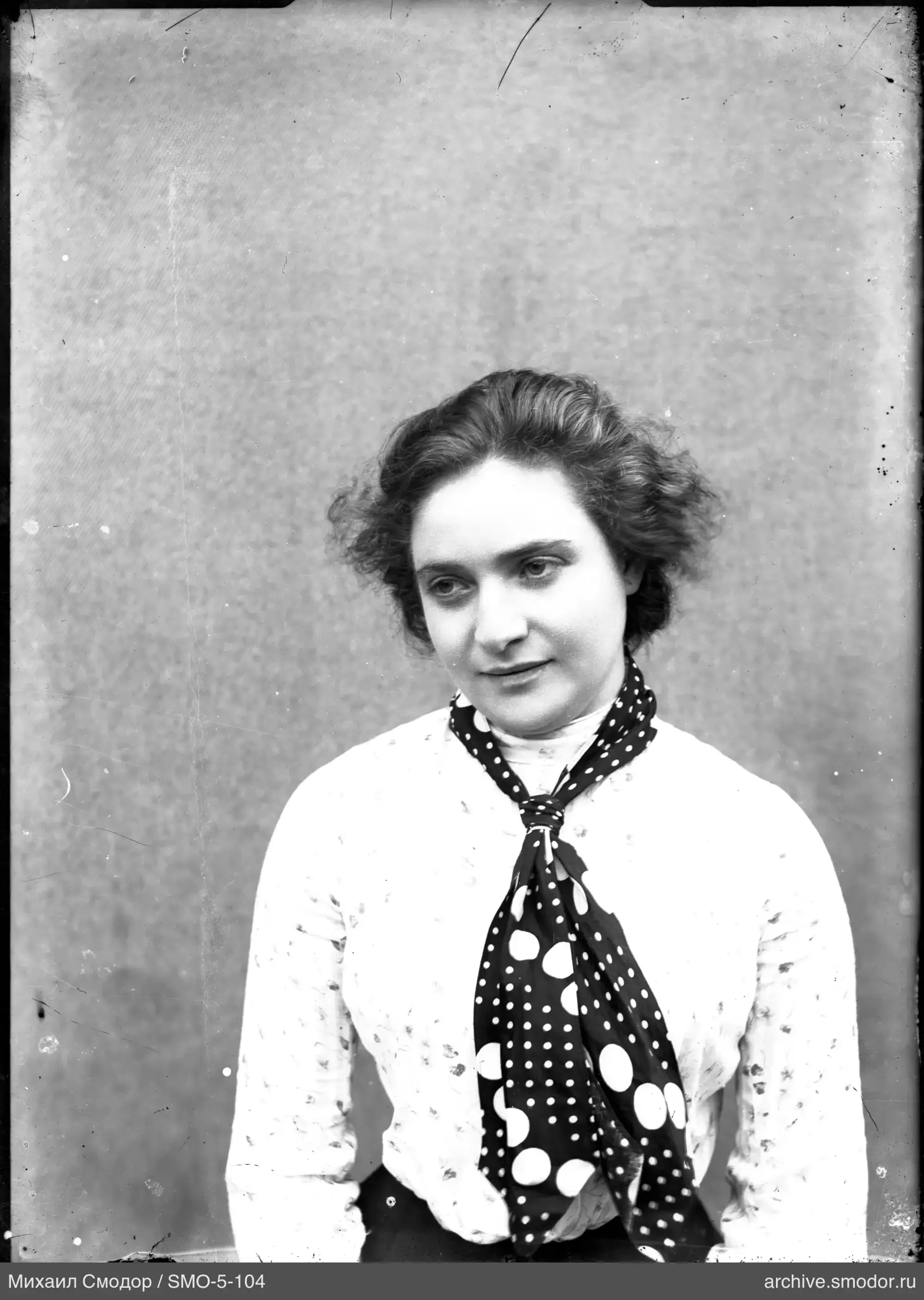 Portrait of a woman with short wavy hair
