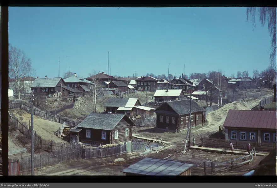 Village landscape with houses and people