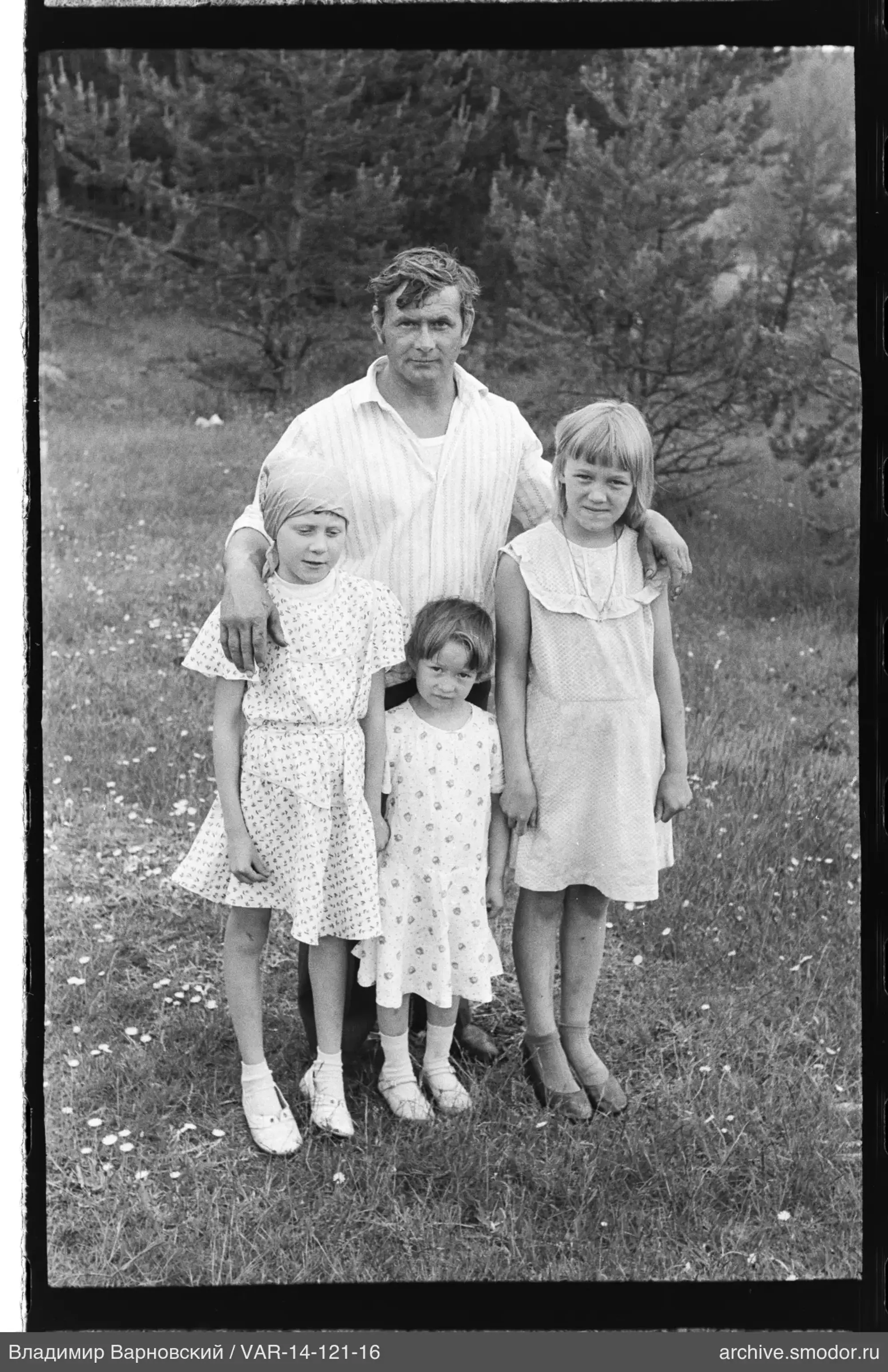 Group portrait with man and girls